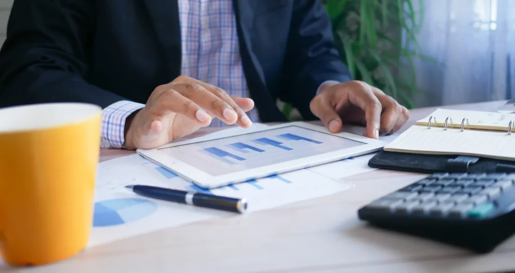 Person working out costs How Much Money Do You Need to Invest in Property UK? 