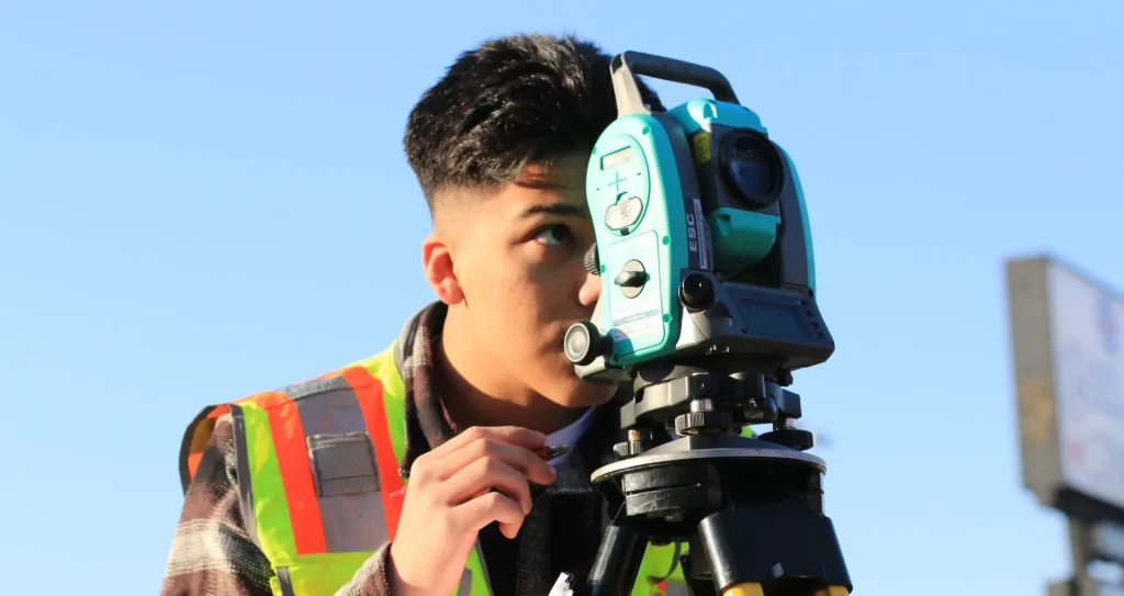 taxes & fees when buying property in the uk person carrying out a property survey